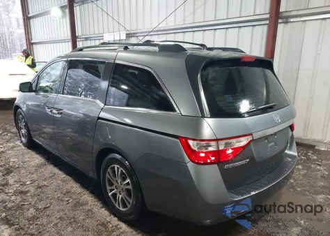 2012 Honda Odyssey Ex-L z USA, uszkodzony, nr VIN 5FNRL5H60CB102974